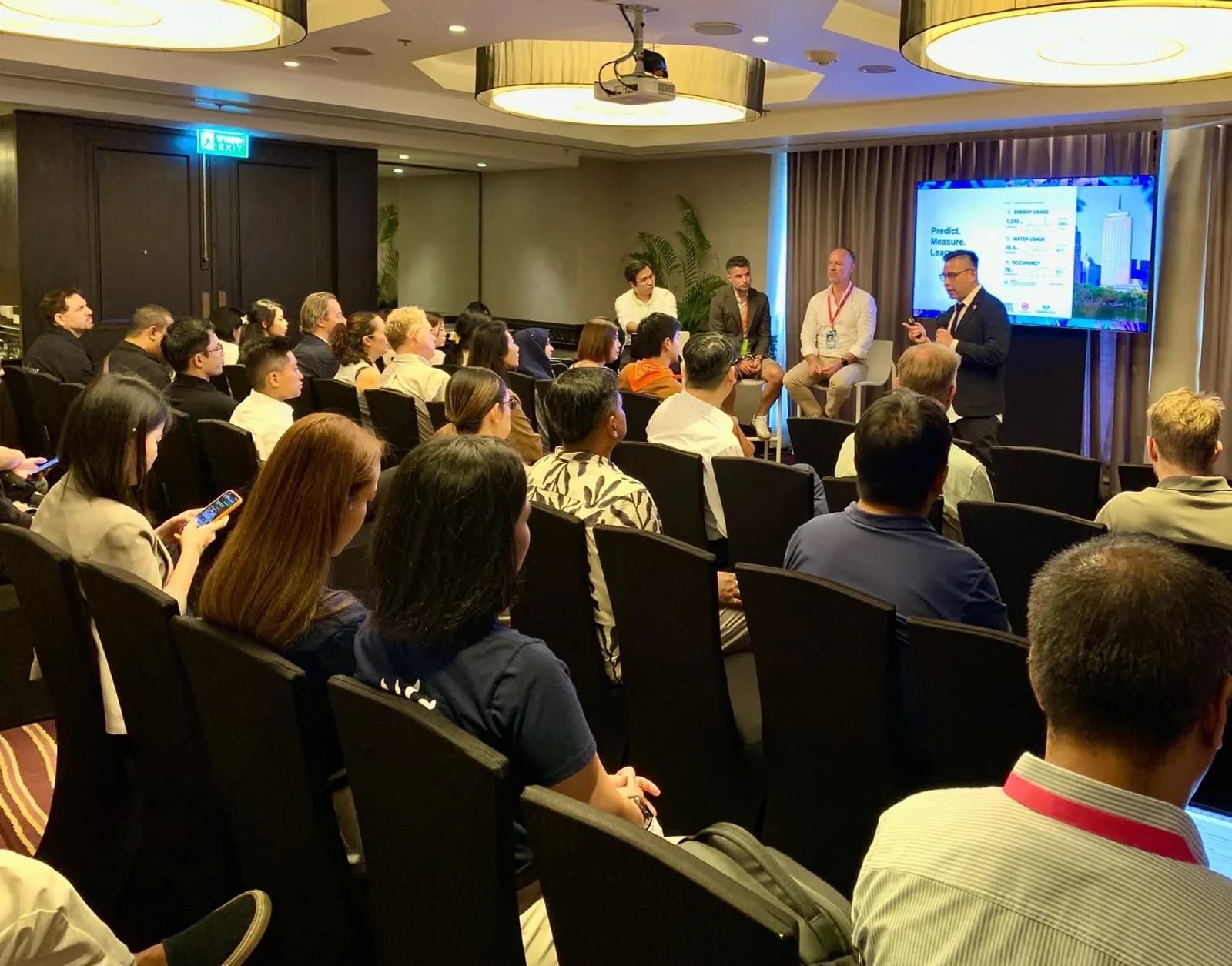 Audience attending a PHIST 2026 discussion on hotel energy and design in Phuket.